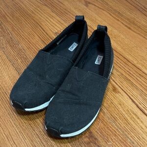 TOMS Classic Black Canvas Slip-Ons